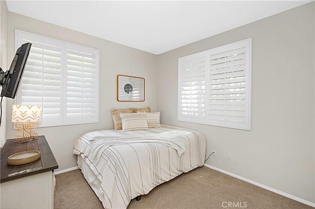 22 Amesbury Ct, Ladera Ranch, CA 92694 - bedroom with carpet floors, baseboards, and multiple windows