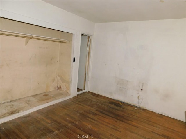 8553 Chimineas Ave, Northridge, CA 91325 - unfurnished bedroom with wood-type flooring and a closet