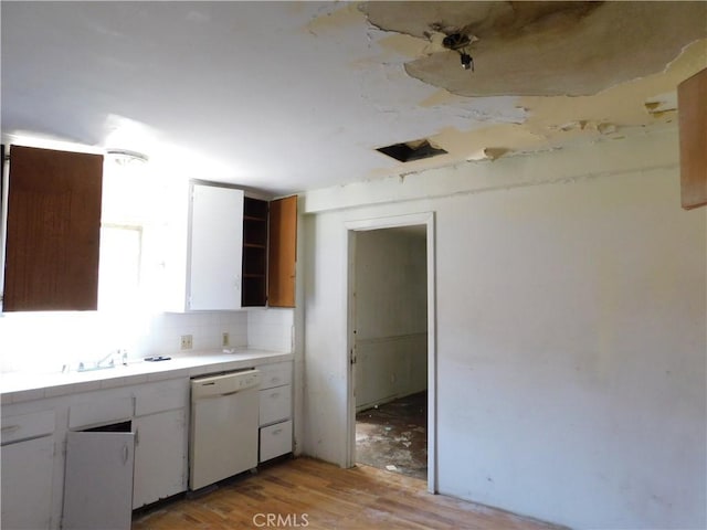 8553 Chimineas Ave, Northridge, CA 91325 - kitchen with dishwasher, tile countertops, white cabinets, and light wood-type flooring