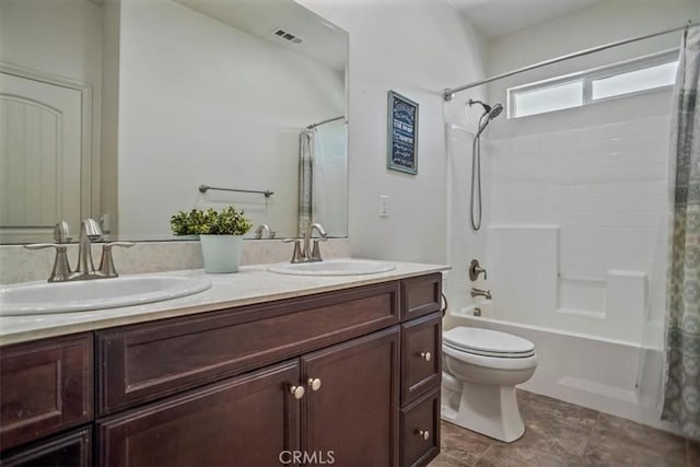 full bath with toilet, shower / bath combination with curtain, and double vanity