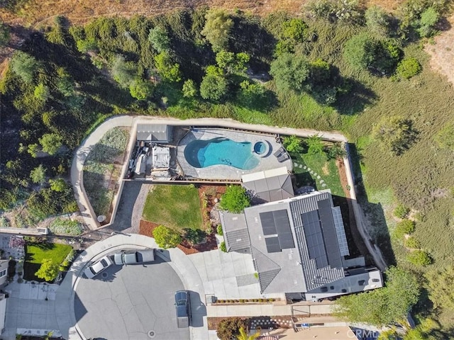 aerial view of property's location with a pool