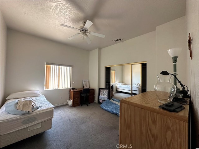 15360 Mandan Rd, Apple Valley, CA 92307 - bedroom with carpet floors, a closet, a desk, baseboards, and ceiling fan
