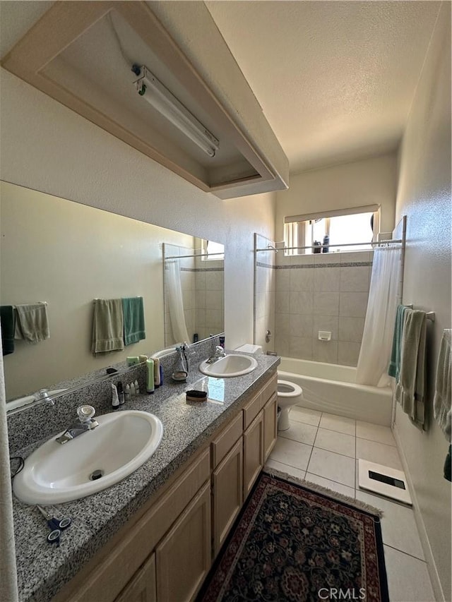 15360 Mandan Rd, Apple Valley, CA 92307 - full bath with shower / tub combo with curtain, toilet, double vanity, tile patterned flooring, and a textured ceiling
