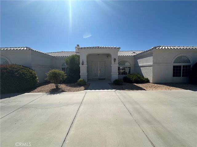 15360 Mandan Rd, Apple Valley, CA 92307 - mediterranean / spanish-style house with stucco siding