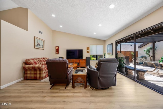 286 W Montecito Ave Unit K, Sierra Madre, CA 91024 - living area with light wood-style flooring, a textured ceiling, vaulted ceiling, recessed lighting, and baseboards