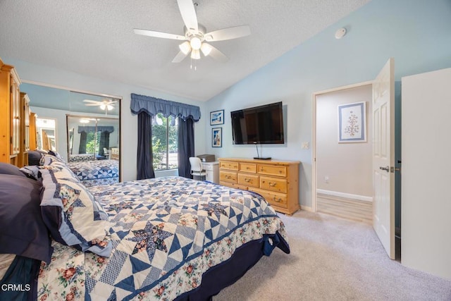 286 W Montecito Ave Unit K, Sierra Madre, CA 91024 - carpeted bedroom with vaulted ceiling, a textured ceiling, ceiling fan, and baseboards