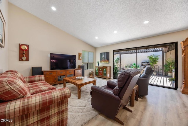 286 W Montecito Ave Unit K, Sierra Madre, CA 91024 - living room featuring a textured ceiling, light wood-style flooring, lofted ceiling, and recessed lighting