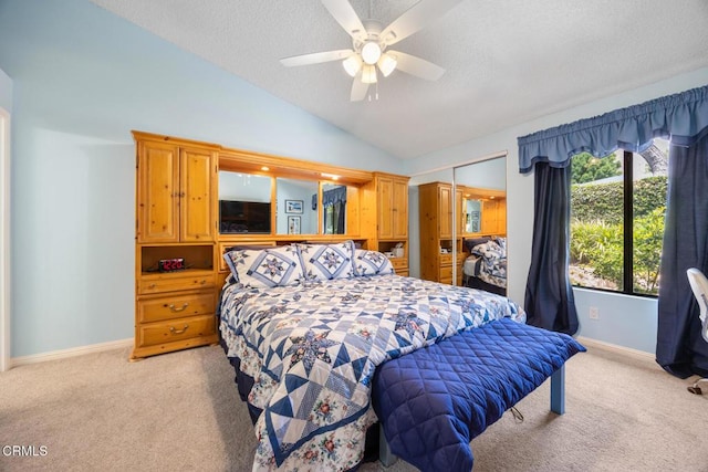 286 W Montecito Ave Unit K, Sierra Madre, CA 91024 - bedroom with light carpet, vaulted ceiling, baseboards, a textured ceiling, and a closet