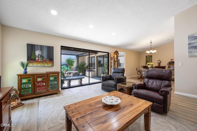 286 W Montecito Ave Unit K, Sierra Madre, CA 91024 - living area with a chandelier, a textured ceiling, light wood-style floors, recessed lighting, and baseboards