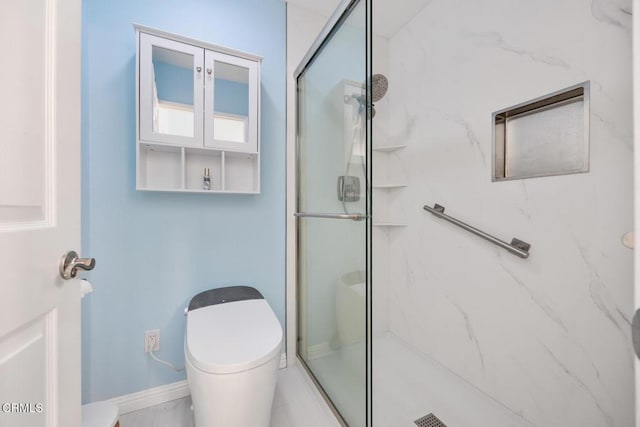 286 W Montecito Ave Unit K, Sierra Madre, CA 91024 - bathroom featuring a marble finish shower, toilet, and baseboards