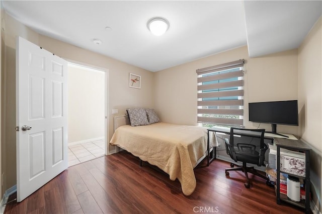 414 Silk Tree, Irvine, CA 92606 - bedroom with dark wood-style flooring, a desk, and baseboards
