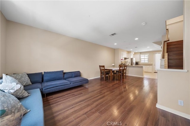 414 Silk Tree, Irvine, CA 92606 - living area featuring wood finished floors, baseboards, stairs, and recessed lighting
