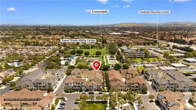 414 Silk Tree, Irvine, CA 92606 - aerial view of residential area with a mountainous background