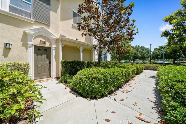 414 Silk Tree, Irvine, CA 92606 - doorway to property with stucco siding