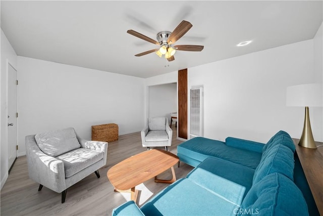 1599 21st St, Oceano, CA 93445 - living area with a heating unit, ceiling fan, wood finished floors, and baseboards