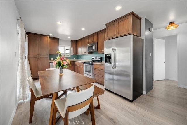 1599 21st St, Oceano, CA 93445 - kitchen featuring appliances with stainless steel finishes, light wood-style flooring, baseboards, and recessed lighting