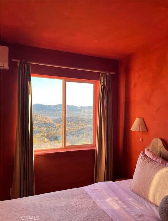 56714 Nelson Ave, Yucca Valley, CA 92284 - bedroom featuring a wall mounted AC and a mountain view