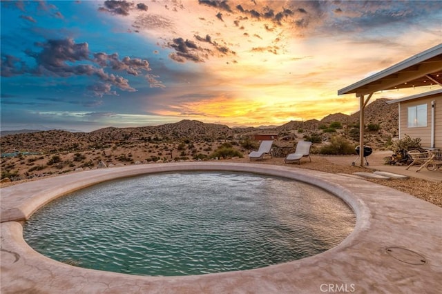 56714 Nelson Ave, Yucca Valley, CA 92284 - swimming pool featuring a mountain view and a patio area