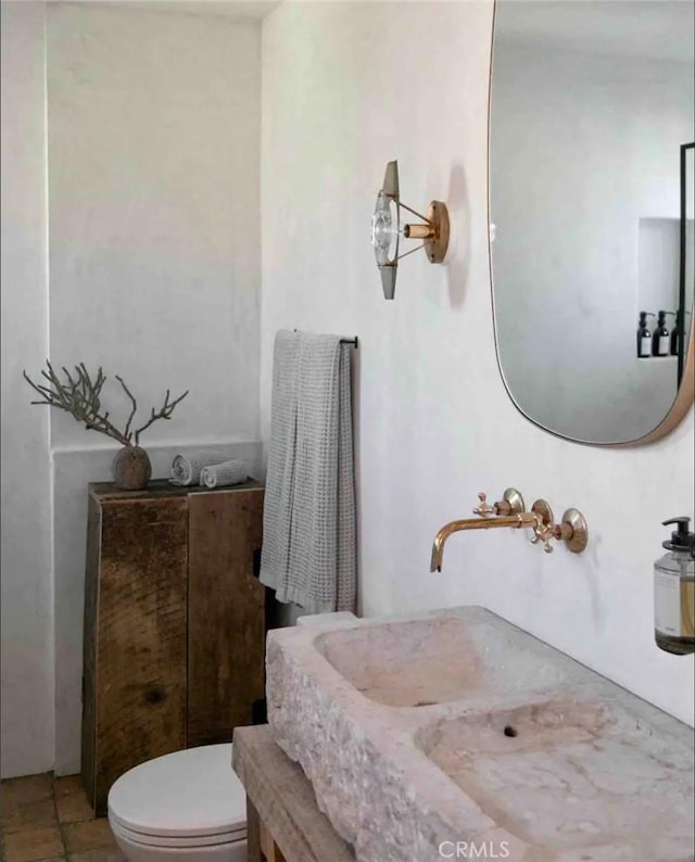 56714 Nelson Ave, Yucca Valley, CA 92284 - bathroom featuring toilet and vanity