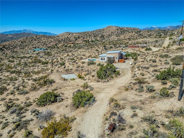 56714 Nelson Ave, Yucca Valley, CA 92284 - aerial view of sparsely populated area with a desert landscape and a mountainous background