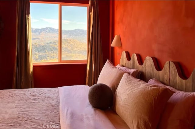56714 Nelson Ave, Yucca Valley, CA 92284 - bedroom featuring multiple windows and a mountain view