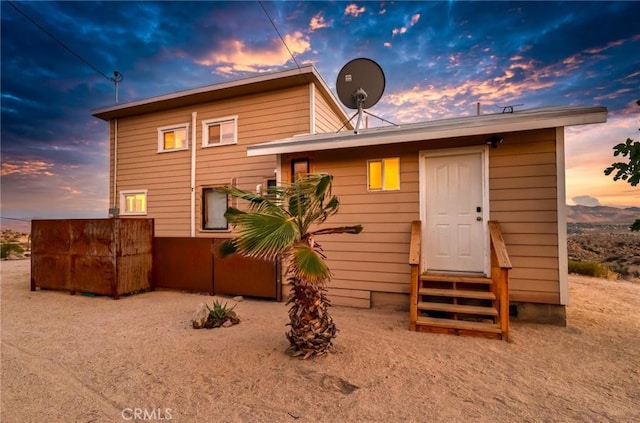 56714 Nelson Ave, Yucca Valley, CA 92284 - back of property at dusk with entry steps