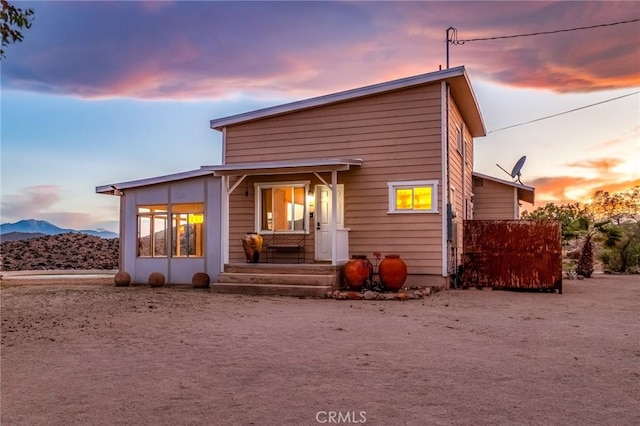 56714 Nelson Ave, Yucca Valley, CA 92284 - back of property at dusk with a mountain view
