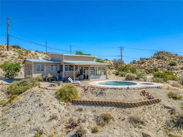 56714 Nelson Ave, Yucca Valley, CA 92284 - rear view of house featuring a sunroom