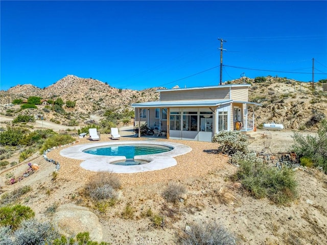56714 Nelson Ave, Yucca Valley, CA 92284 - view of pool with a sunroom and a mountain view