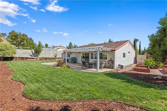 20155 Keaton St, Canyon Country, CA 91351 - rear view of property featuring a patio area, a pergola, stucco siding, and a garden