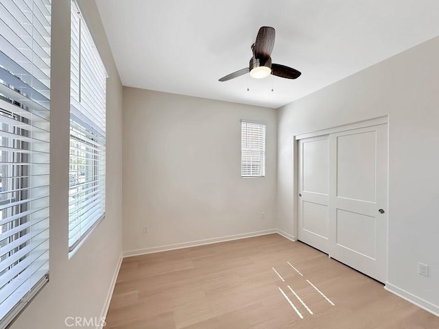 843 Cranberry Way, Upland, CA 91786 - unfurnished bedroom with light wood-type flooring, baseboards, a closet, and ceiling fan