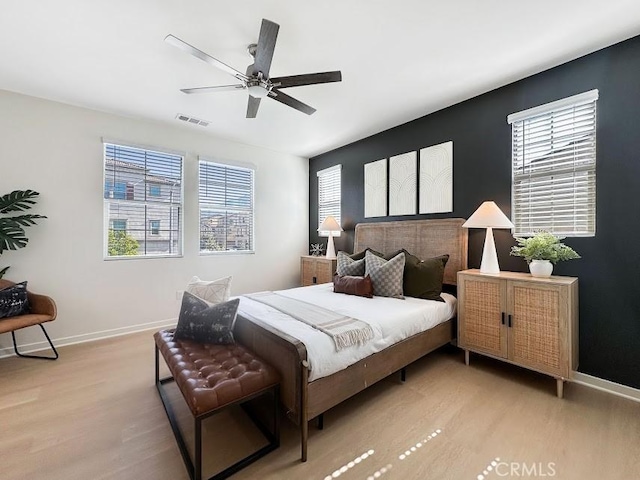 843 Cranberry Way, Upland, CA 91786 - bedroom with light wood-style floors, multiple windows, and baseboards