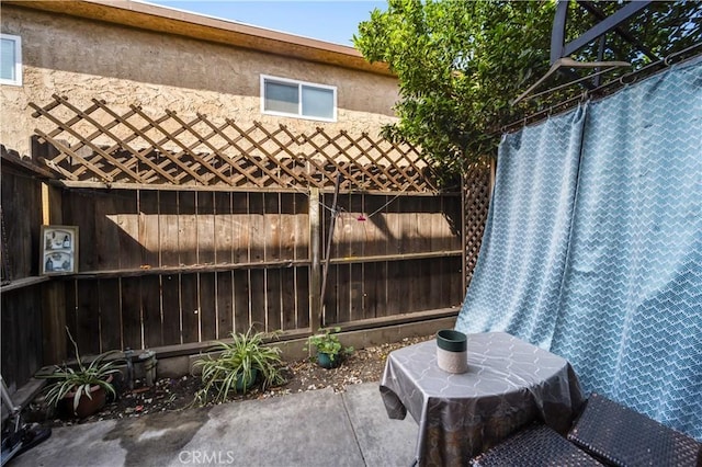 9051 Cedros Ave Unit 5, Panorama City, CA 91402 - view of patio / terrace with fence