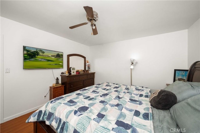 9051 Cedros Ave Unit 5, Panorama City, CA 91402 - bedroom with wood finished floors, ceiling fan, and baseboards