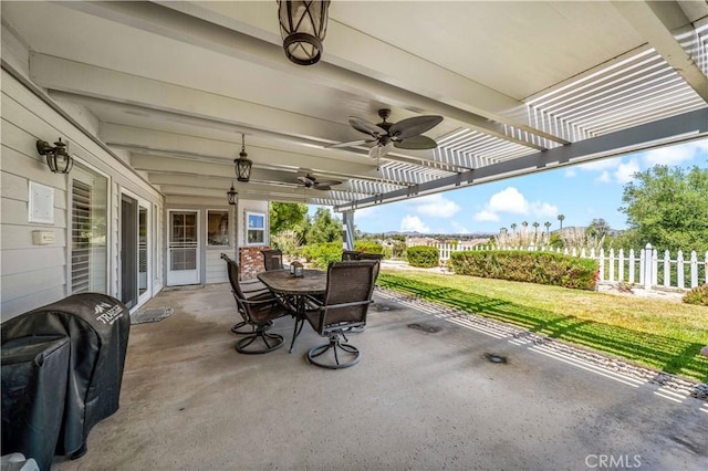 view of patio with outdoor dining area, fence, a pergola, and ceiling fan