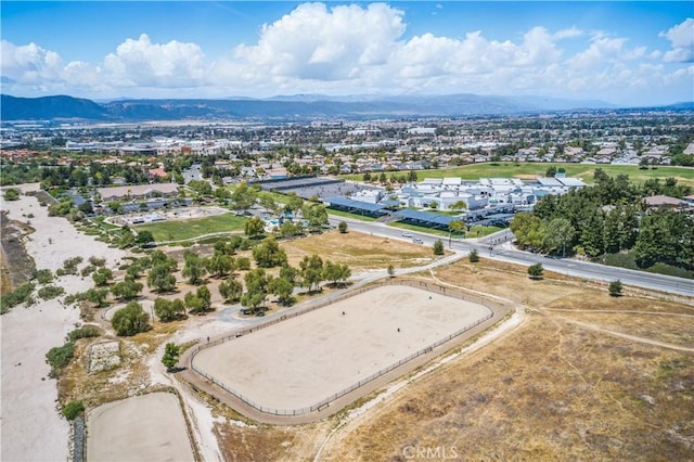 drone / aerial view of a mountainous background
