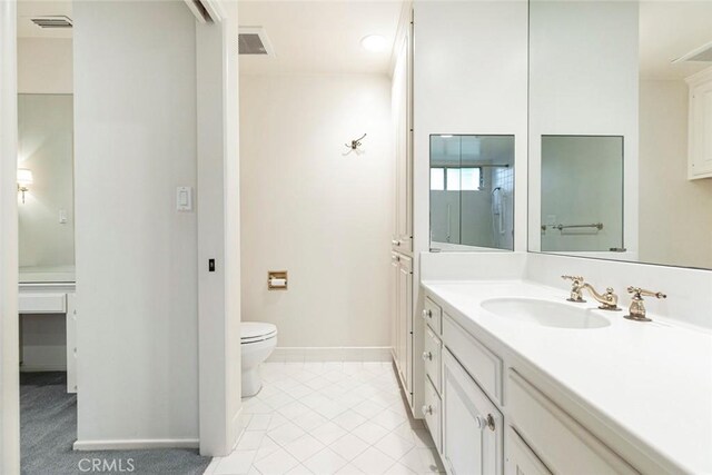 1558 Hillcrest Ave, Glendale, CA 91202 - bathroom featuring vanity, toilet, baseboards, and tile patterned floors