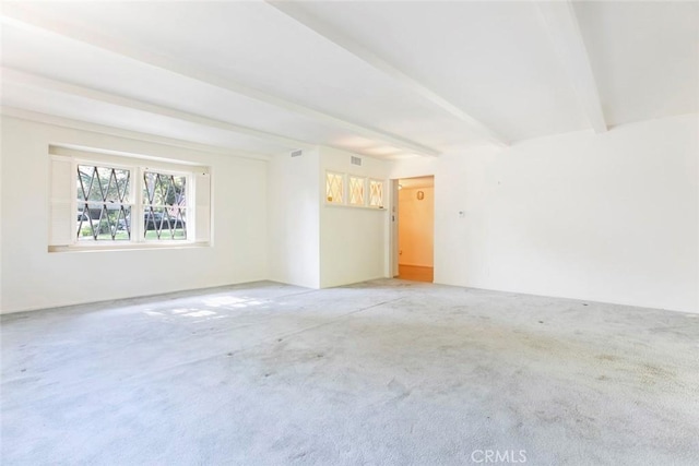 1558 Hillcrest Ave, Glendale, CA 91202 - spare room with beam ceiling and light colored carpet