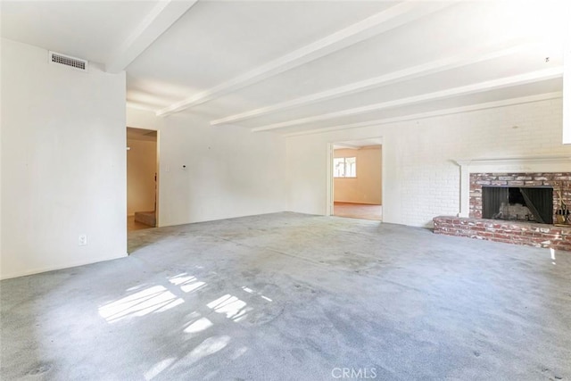 1558 Hillcrest Ave, Glendale, CA 91202 - unfurnished living room with beamed ceiling, carpet floors, and a brick fireplace