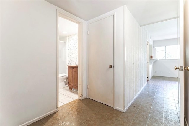 1558 Hillcrest Ave, Glendale, CA 91202 - hallway featuring baseboards and light tile patterned floors