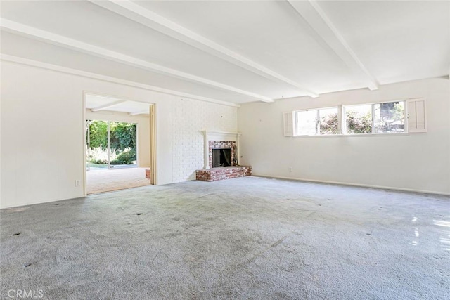 1558 Hillcrest Ave, Glendale, CA 91202 - unfurnished living room with beam ceiling, carpet, healthy amount of natural light, and a brick fireplace