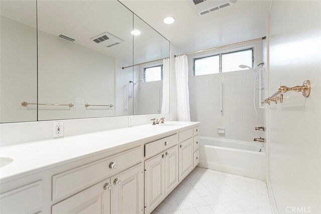 1558 Hillcrest Ave, Glendale, CA 91202 - bathroom featuring double vanity, shower / tub combo with curtain, tile patterned floors, and recessed lighting