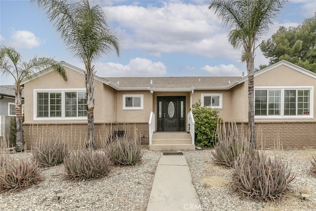 7857 Whitsett Ave, North Hollywood, CA 91605 - ranch-style house featuring brick siding and stucco siding