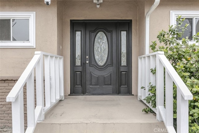 7857 Whitsett Ave, North Hollywood, CA 91605 - view of exterior entry featuring stucco siding