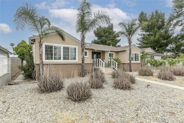 7857 Whitsett Ave, North Hollywood, CA 91605 - ranch-style home with stucco siding and brick siding