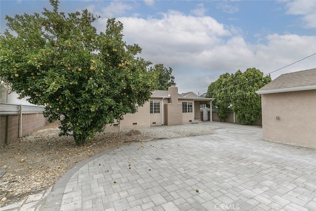 7857 Whitsett Ave, North Hollywood, CA 91605 - back of property with a patio area and a chimney