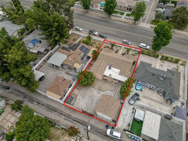 7857 Whitsett Ave, North Hollywood, CA 91605 - aerial perspective of suburban area featuring property parcel outlined