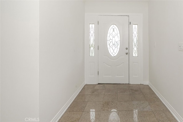 7857 Whitsett Ave, North Hollywood, CA 91605 - foyer entrance featuring baseboards and granite floors