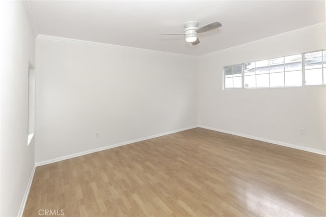 7857 Whitsett Ave, North Hollywood, CA 91605 - spare room featuring light wood-style flooring, baseboards, ceiling fan, and crown molding