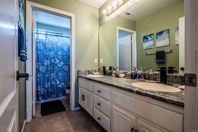 3035 Cat Tail Ct, Hemet, CA 92545 - bathroom featuring double vanity and curtained shower
